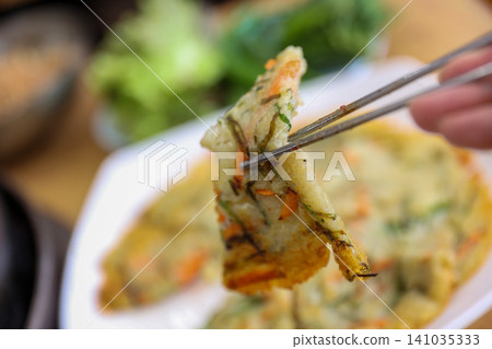 Crispy Pan Fried Traditional Korean Potato Pancake Gamjajeon Crispy Pan Fried Traditional Korean Potato Pancake Gamjajeon 141035333