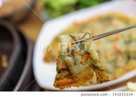 Crispy Pan Fried Traditional Korean Potato Pancake Gamjajeon 141035334