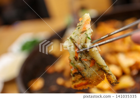 Crispy Pan Fried Traditional Korean Potato Pancake Gamjajeon Crispy Pan Fried Traditional Korean Potato Pancake Gamjajeon 141035335