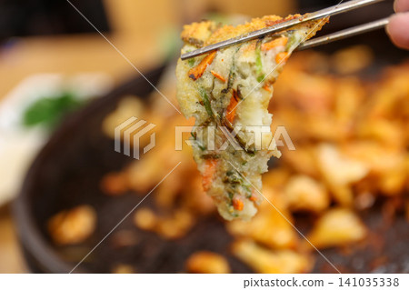 Crispy Pan Fried Traditional Korean Potato Pancake Gamjajeon Crispy Pan Fried Traditional Korean Potato Pancake Gamjajeon 141035338
