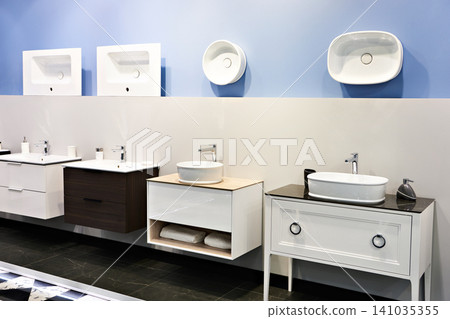 Bathroom sinks and furniture in store Bathroom sinks and furniture in store 141035355