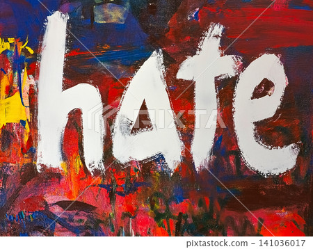 Graffiti art featuring the word hate in a colorful and bold urban painting with strong expression Graffiti art featuring the word hate in a colorful and bold urban painting with strong expression 141036017