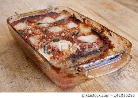 Eggplant parmigiana in glass baking dish Eggplant parmigiana in glass baking dish 141036286