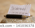 Fountain pen and signature concept on paper for legal document 141036378