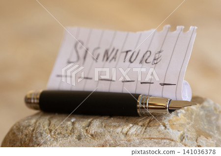 Fountain pen and signature concept on paper for legal document Fountain pen and signature concept on paper for legal document 141036378