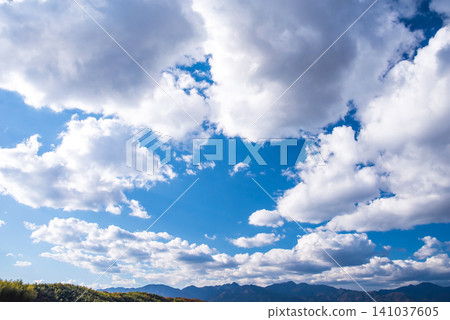 Clouds flowing in the blue sky Clouds flowing in the blue sky 141037605