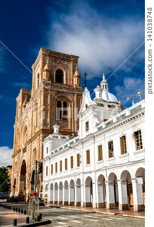The brick towers and white colonial facade of the Cathedral of the Immaculate Conception or the New Cathedral of Cuenca in Ecuador The brick towers and white colonial facade of the Cathedral of the Immaculate Conception or the New Cathedral of Cuenca in Ecuador 141038748
