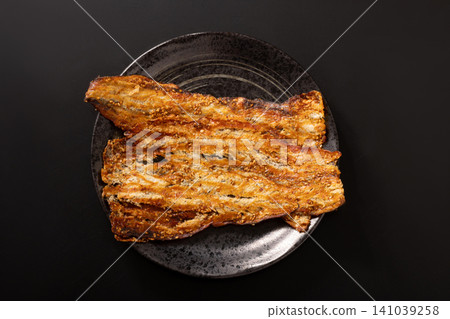 Grilled conger eel, soy sauce flavor, dried seafood product Grilled conger eel, soy sauce flavor, dried seafood product 141039258