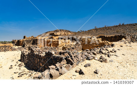 Ancient stone and mud brick ruins of Shanqal Fort located in the desert landscape of Turbah, Makkah Province, Saudi Arabia. Ancient stone and mud brick ruins of Shanqal Fort located in the desert landscape of Turbah, Makkah Province, Saudi Arabia. 141039307