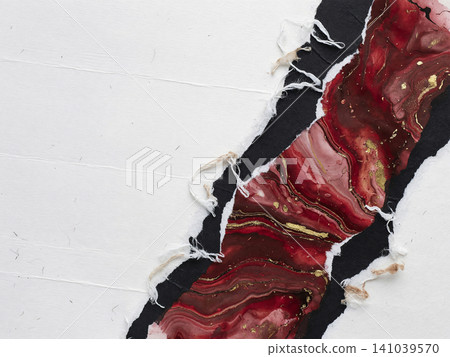 A background of deep red and gold marble watercolors peeking through torn black Japanese paper on the right. A background of deep red and gold marble watercolors peeking through torn black Japanese paper on the right. 141039570