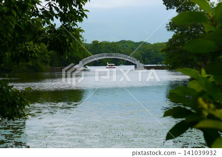 Hakodate's Onuma Quasi-National Park is beautiful with its numerous small islands and bridges that appear to float on the water's surface. Hakodate's Onuma Quasi-National Park is beautiful with its numerous small islands and bridges that appear to float on the water's surface. 141039932