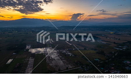 aerial view of colorful sky above the mountain. aerial view of colorful sky above the mountain. 141040663