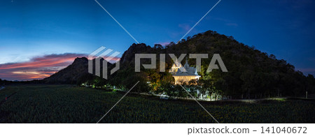 Aerial view of pink cloud in Sunset Over sunflower field. 141040672