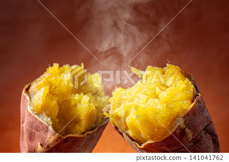 Freshly baked sweet potatoes with plenty of honey inside Freshly baked sweet potatoes with plenty of honey inside 141041762