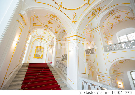 Interior of Bratislava Castle. Stone staircase and red carpet. Slovakia 141041776