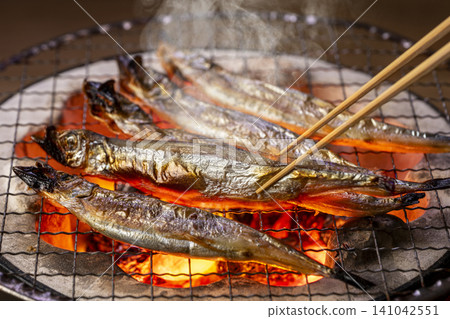 Delicious-looking charcoal-grilled smelt Delicious-looking charcoal-grilled smelt 141042551