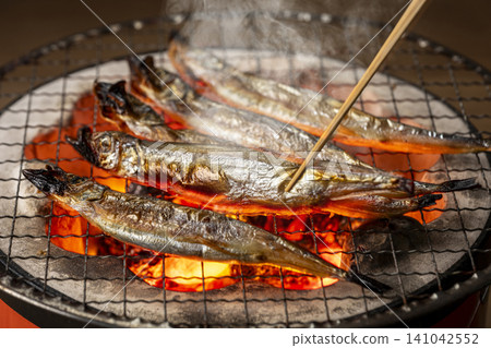 Delicious-looking charcoal-grilled smelt Delicious-looking charcoal-grilled smelt 141042552