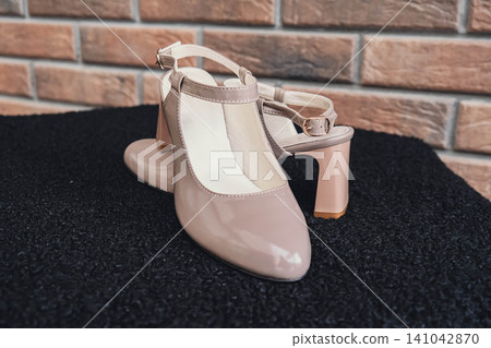 Elegant patent leather sandals high heels blank product for branding displayed. New casual female sandals no-brand footwear e-commerce. No logo product unbranded fashion footwear Elegant patent leather sandals high heels blank product for branding displayed. New casual female sandals no-brand footwear e-commerce. No logo product unbranded fashion footwear 141042870