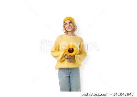 Woman smiles with sunflower in bright sweater, PNG Woman smiles with sunflower in bright sweater, PNG 141042943