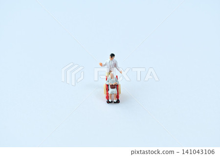 Image of a senior citizen in a wheelchair and their caregiver taking a walk. Image of a senior citizen in a wheelchair and their caregiver taking a walk. 141043106