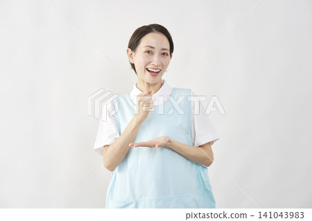 Female caregiver has an idea (white background) Female caregiver has an idea (white background) 141043983