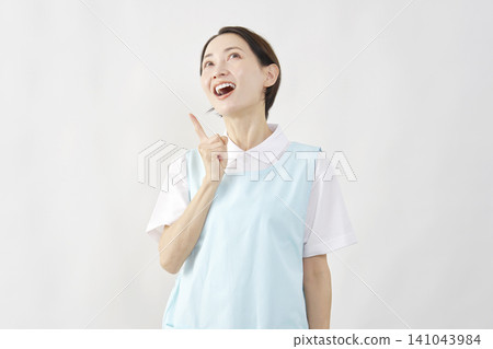 Female caregiver has an idea (white background) Female caregiver has an idea (white background) 141043984