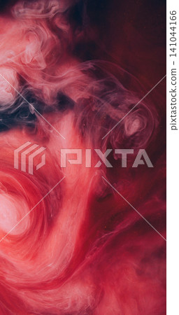 Mystical smoke. Vivid flow. Vibrant color fluid swirl ink underwater blur splash. Spiral red pink drop twirl abstract blend background. Mystical smoke. Vivid flow. Vibrant color fluid swirl ink underwater blur splash. Spiral red pink drop twirl abstract blend background. 141044166