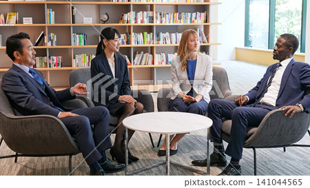 Group of multinational business people having a conversation in a lobby Group of multinational business people having a conversation in a lobby 141044565