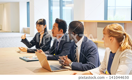 A group of multinational business people having a meeting A group of multinational business people having a meeting 141044630