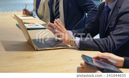 A group of multinational business people having a meeting A group of multinational business people having a meeting 141044635
