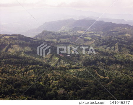 Mountains and valleys stretch across a green landscape in Nicaragua 141046277