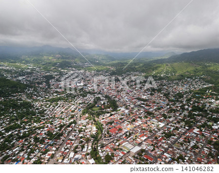 City view from above showing buildings, roads, and hills in daylight City view from above showing buildings, roads, and hills in daylight 141046282