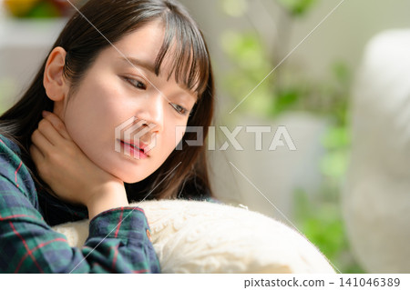 A young woman who thinks A young woman who thinks 141046389