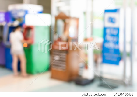 Blurred interior self service kiosks payment machines modern public space soft focus background suitable for retail technology banking customer service themes Blurred interior self service kiosks payment machines modern public space soft focus background suitable for retail technology banking customer service themes 141046595