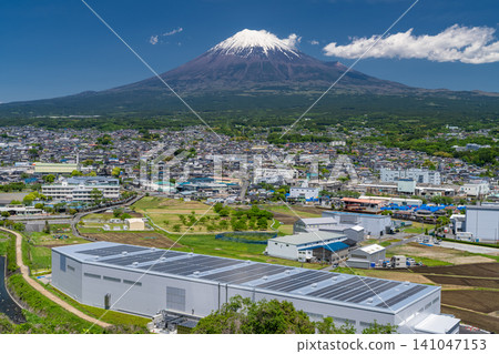 A view of Mount Fuji and the cityscape of Fuji City. A view of Mount Fuji and the cityscape of Fuji City. 141047153