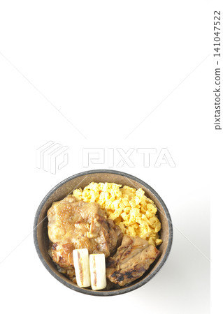 A bowl of scrambled eggs, grilled green onions, and charcoal-grilled chicken photographed against a white background. A bowl of scrambled eggs, grilled green onions, and charcoal-grilled chicken photographed against a white background. 141047522