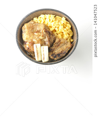 A bowl of scrambled eggs, grilled green onions, and charcoal-grilled chicken photographed against a white background. A bowl of scrambled eggs, grilled green onions, and charcoal-grilled chicken photographed against a white background. 141047523