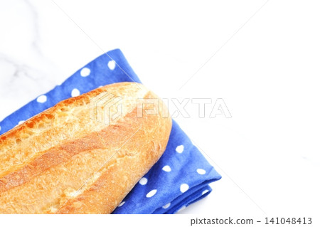 Baguette - Delicious baguettes that are freshly baked Baguette - Delicious baguettes that are freshly baked 141048413