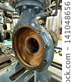 Water pump undergoing disassembly and maintenance. 141048656