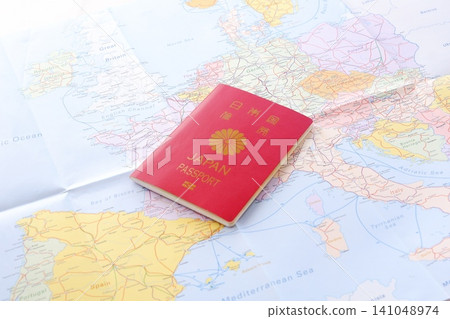 Passport - Image of preparing a passport (regular 10-year red passport) and planning a trip abroad Passport - Image of preparing a passport (regular 10-year red passport) and planning a trip abroad 141048974
