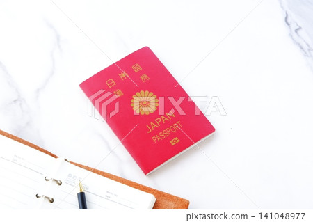 Passport - Image of preparing a passport (regular 10-year red passport) and planning a trip abroad Passport - Image of preparing a passport (regular 10-year red passport) and planning a trip abroad 141048977