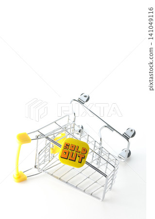 A shopping cart photographed against a white background. A shopping cart photographed against a white background. 141049116