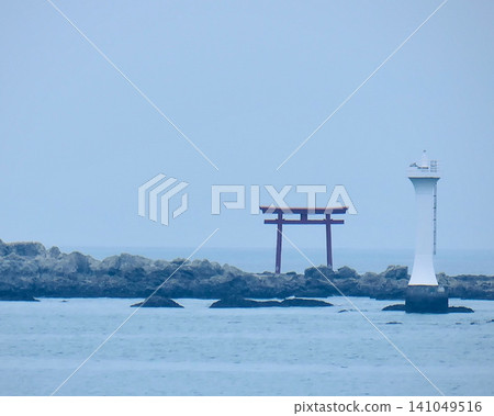 The torii gate and Yujiro Lighthouse at Morito Beach The torii gate and Yujiro Lighthouse at Morito Beach 141049516