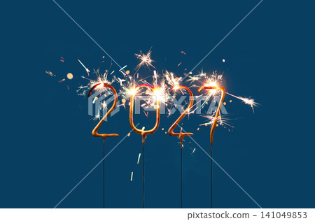 2027 New Year Festive Numbers made with Glowing Sparklers on Dark Background with Copy Space 2027 New Year Festive Numbers made with Glowing Sparklers on Dark Background with Copy Space 141049853