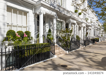 Luxury residential street with white houses in London Luxury residential street with white houses in London 141049874