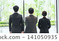 Business group looking out from the office 141050935