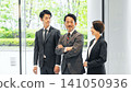 Group of executive business people having a conversation in a lobby 141050936