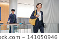 Business person passing through the entrance gate 141050946