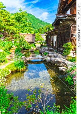 Shirakawa-go in spring: Gassho-zukuri houses and waterways Shirakawa-go in spring: Gassho-zukuri houses and waterways 141051278