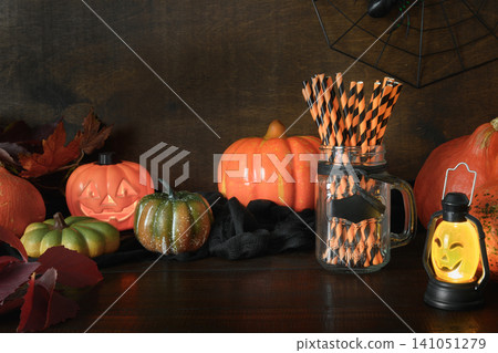 Halloween pumpkin head jack-o-lantern on wooden background Halloween pumpkin head jack-o-lantern on wooden background 141051279